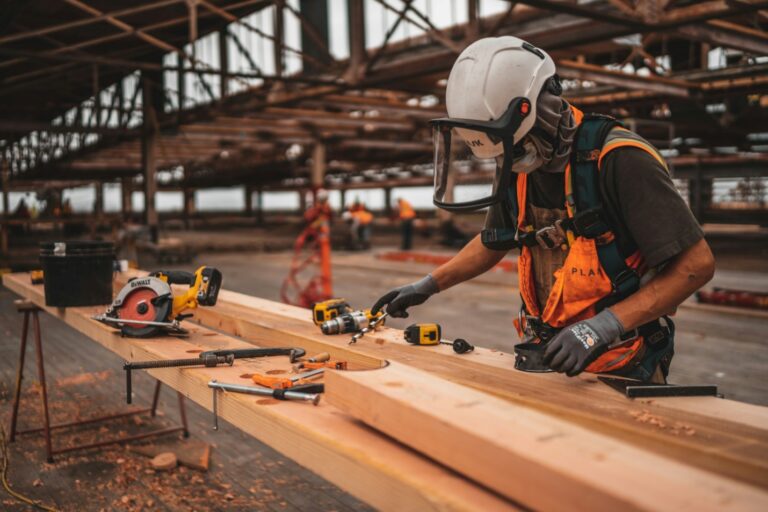 A construction worker wearing an orange vest