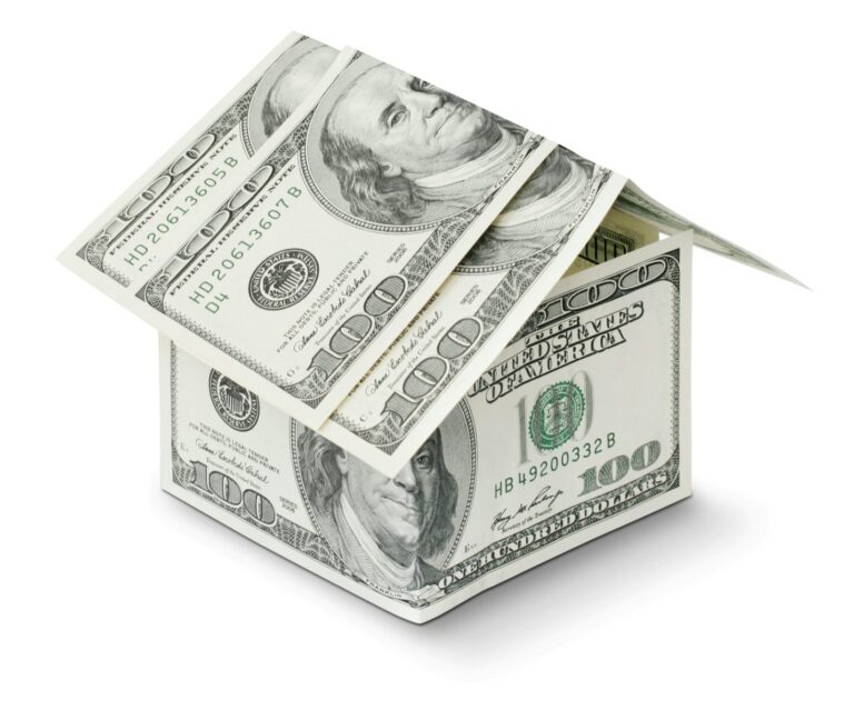 A mini house made of cash